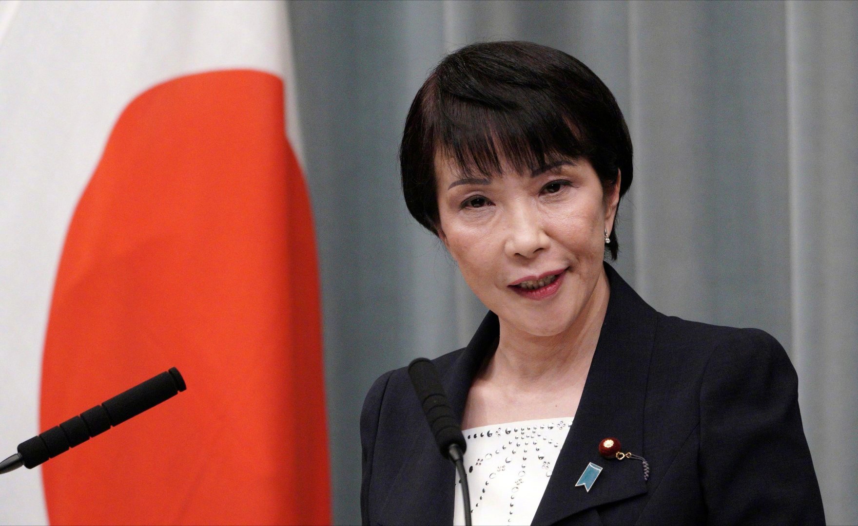 Japanese Prime Minister Sanae Takaiichi’s ruling coalition secured a decisive victory in the February 8, 2026, parliamentary election, giving her a mandate to pursue aggressive military expansion and constitutional reform—moves that have raised alarms among regional neighbors and international observers.