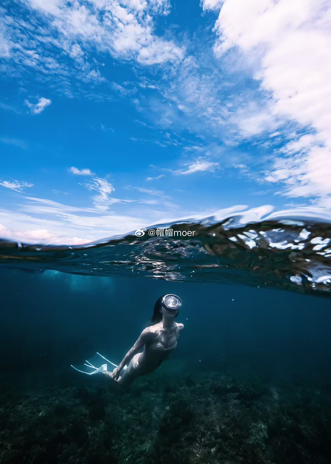 A snorkeler enjoying the clear waters, illustrating one of the island’s popular water activities